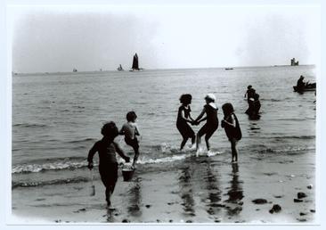 Children paddling in the sea, Douglas