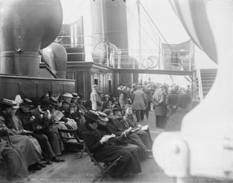 Crowded scene on outside deck of unidentified Steam…
