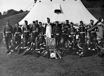 Military band in front of bell tent
