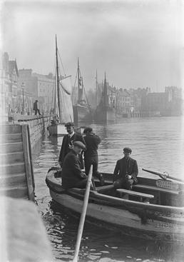 Men in rowing boat near North Quay, Douglas…