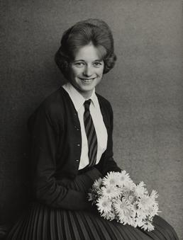 Margaret Corlett, seated holding flowers in Ramsey Grammar…