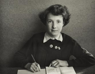 Margaret Jopson, sitting with book in Ramsey Grammar…