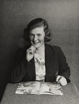 Claire Kerruish, sitting with book in Ramsey Grammar…