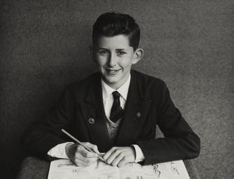 Norman Quayle, sitting with book in Ramsey Grammar…