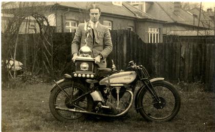Douglas Pirie at home with his Norton and…