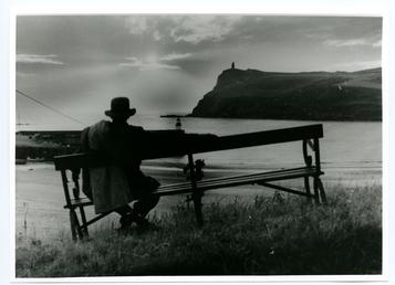 William Hoggatt, sitting viewing Bradda Head at sunset